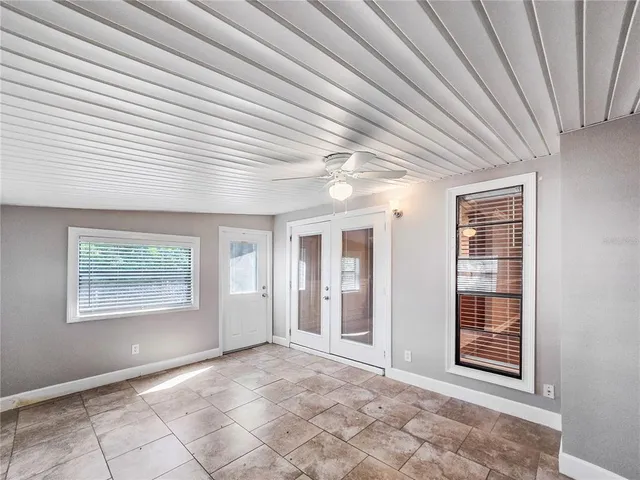 an empty room with windows