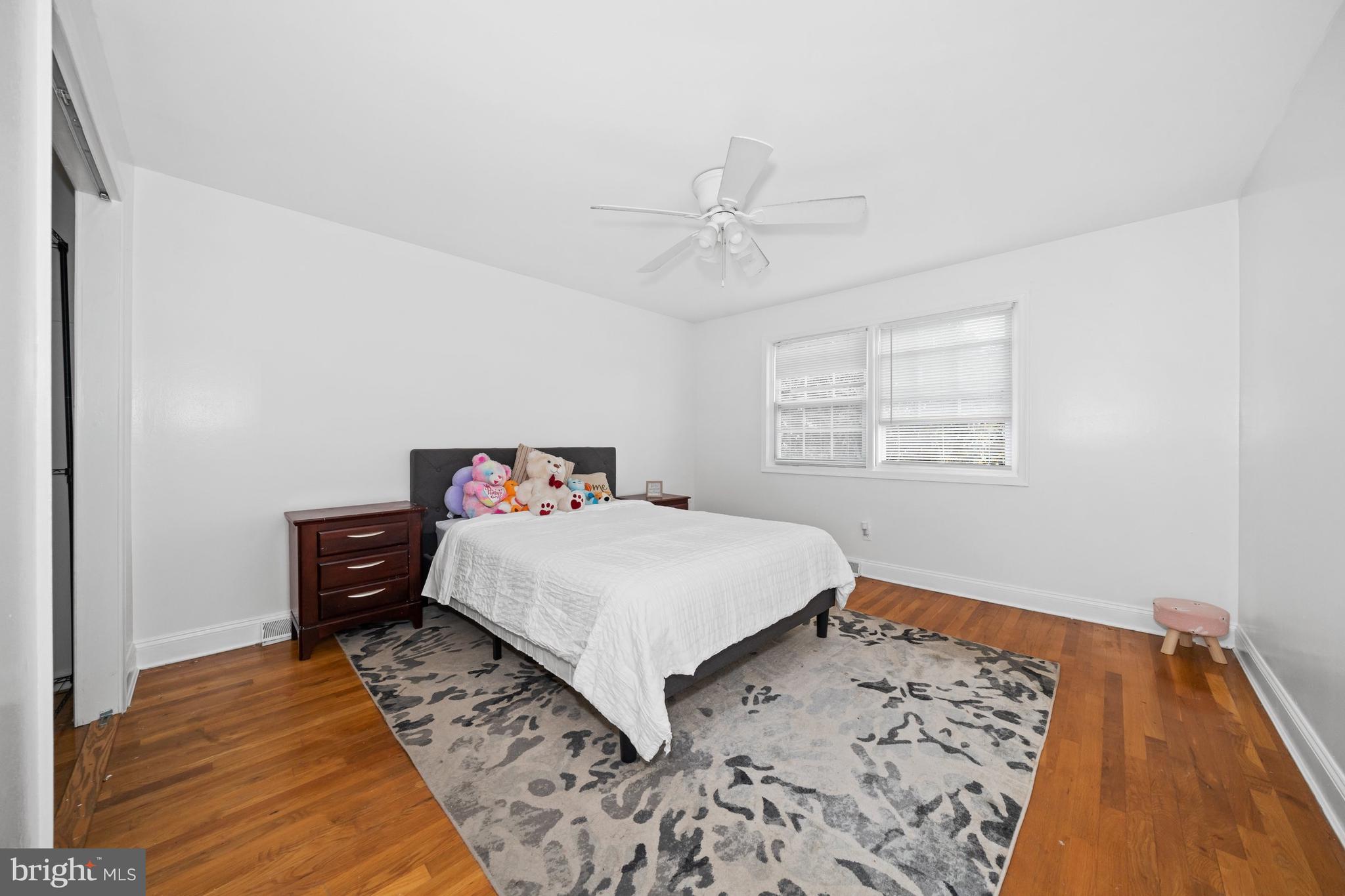 18 George Read Road New Castle, DE 19720 - Photo 24 of 40 a bedroom with a bed and wooden floor