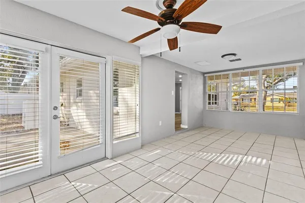 a view of an empty room with a window