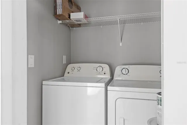 a utility room with dryer and washer