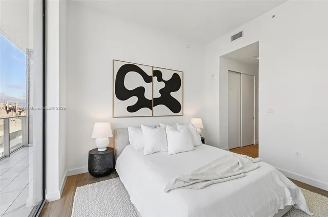 a bathroom with a toilet a sink and a bathtub