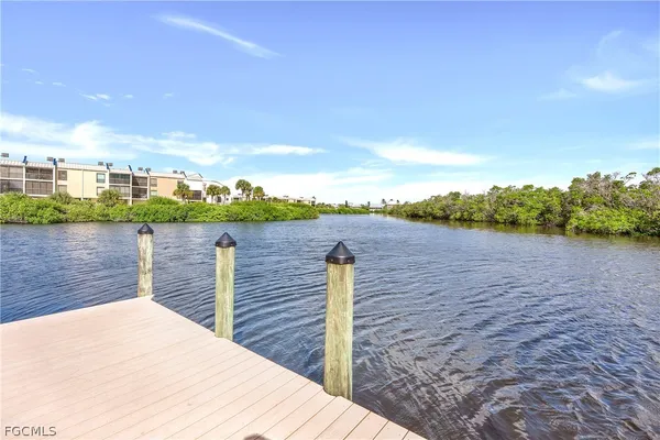 a wooden bridge and lake view