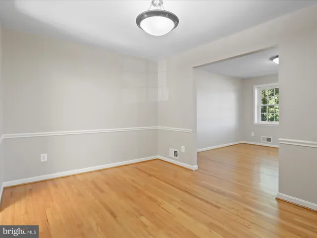 a kitchen with a stove and a microwave