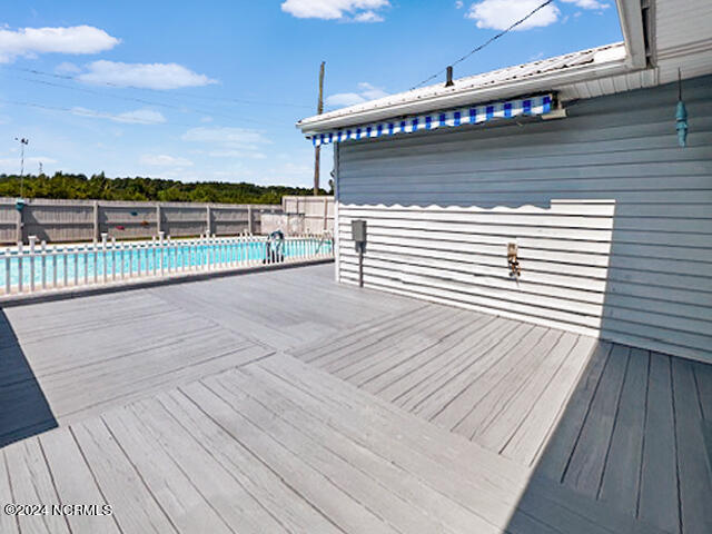 229 Hawthorne Road Edenton, NC 27932 - Photo 16 of 23 Freshly painted deck with sunsetter retractable awning