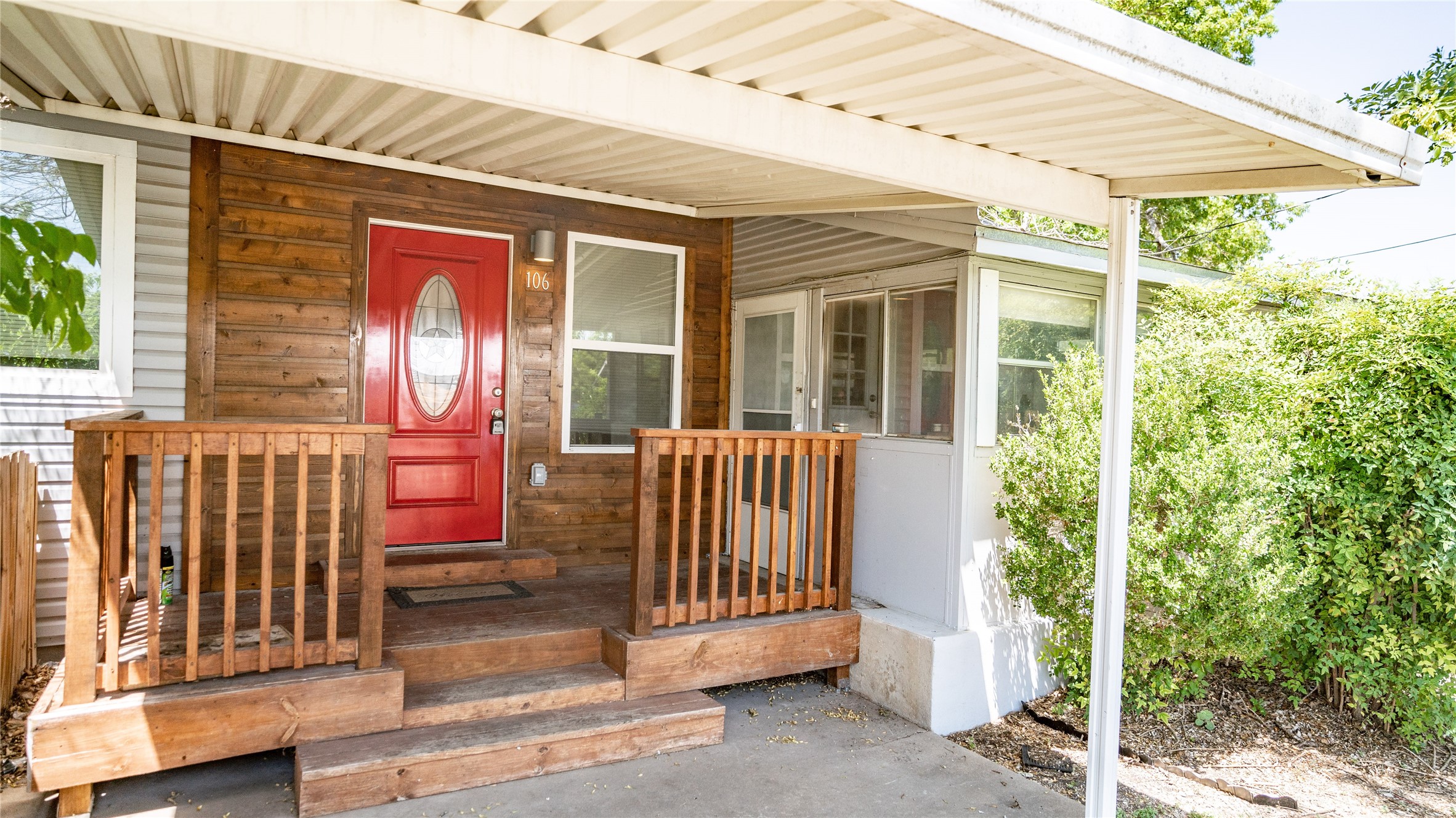106 West Hoopes Avenue Pflugerville, TX 78660 - Photo 1 of 17 Covered porch entry.