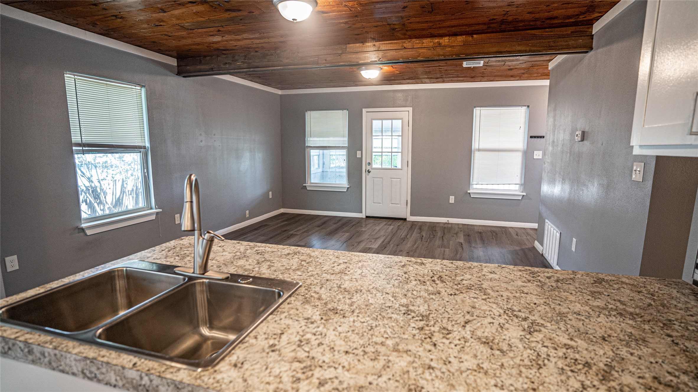 106 West Hoopes Avenue Pflugerville, TX 78660 - Photo 6 of 17 Living room view from the Open kitchen area.