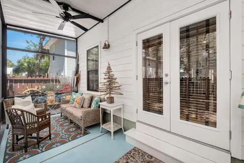 a living room with furniture and a window
