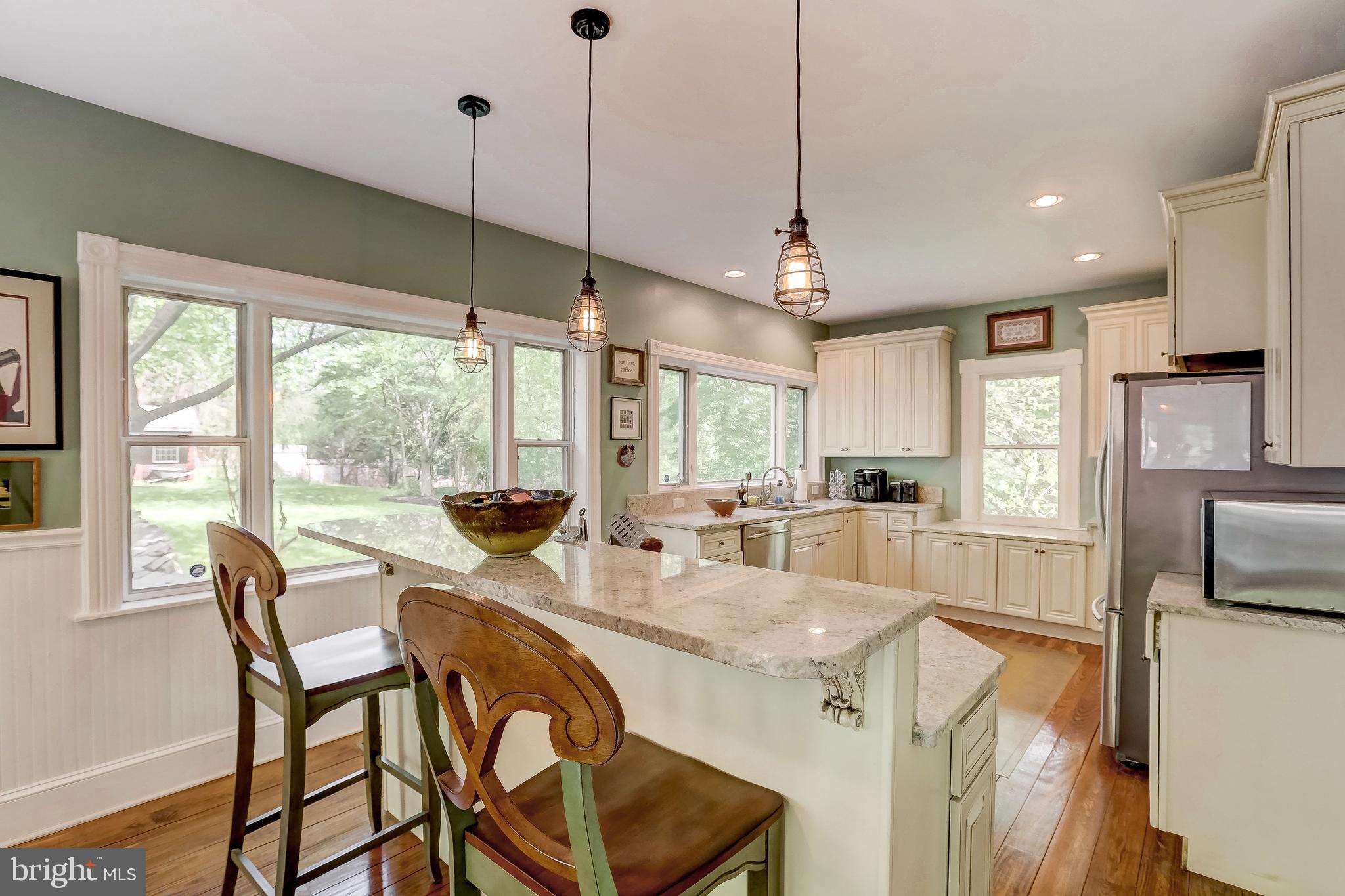 1802 Dixon Road Baltimore, MD 21209 - Photo 18 of 61 Kitchen w/ granite countertops and many upgrades