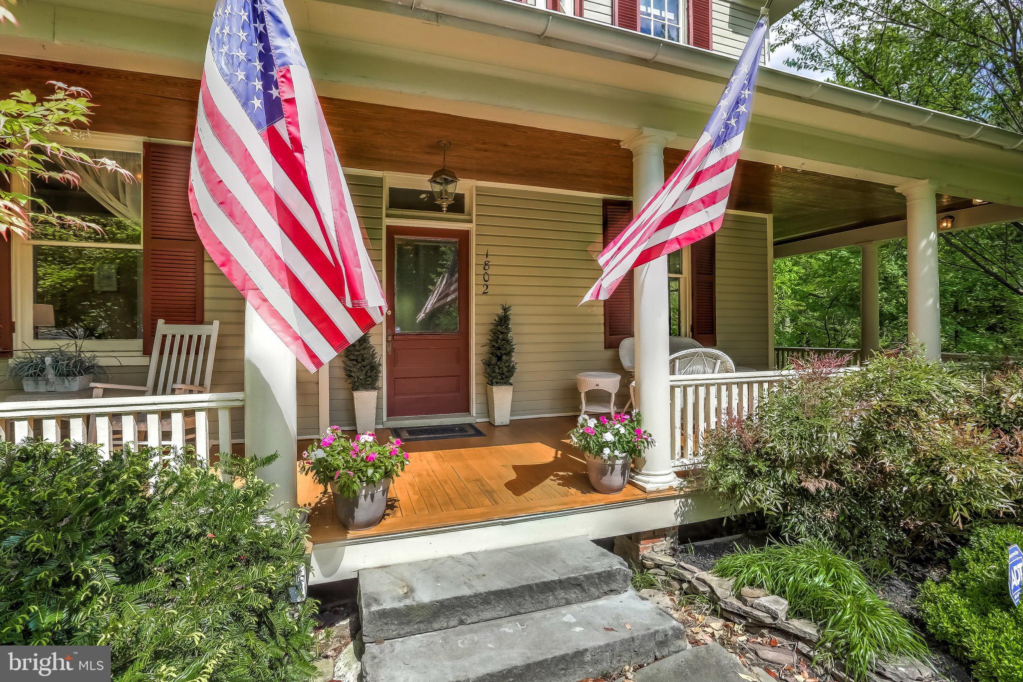 1802 Dixon Road Baltimore, MD 21209 - Photo 4 of 61 Inviting wrap-around porch