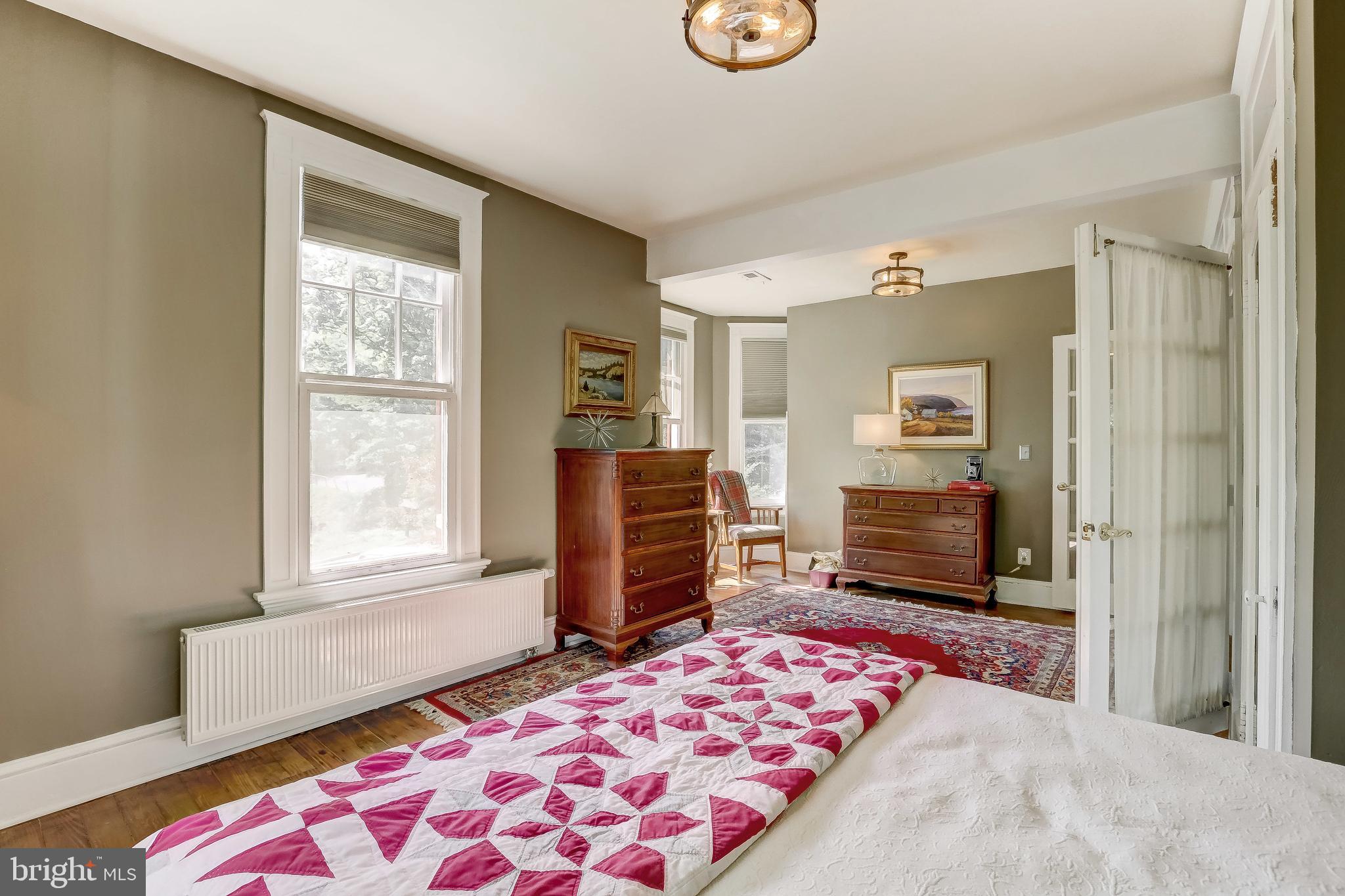 1802 Dixon Road Baltimore, MD 21209 - Photo 31 of 61 Spacious bedroom with hardwood floors