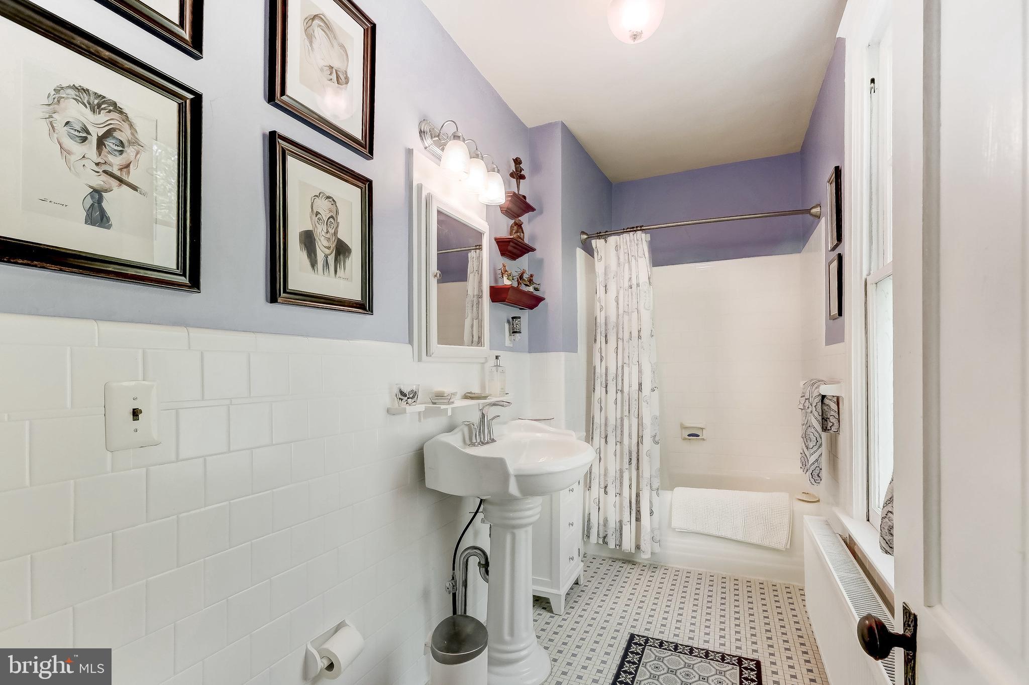 1802 Dixon Road Baltimore, MD 21209 - Photo 35 of 61 Attractive full bath with tile walls and flooring