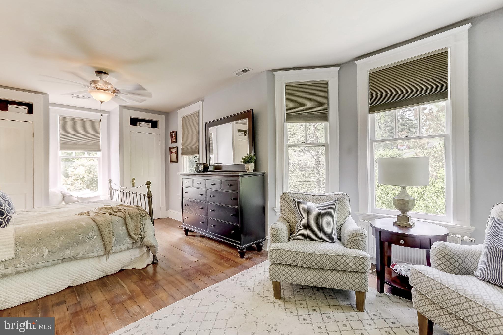 1802 Dixon Road Baltimore, MD 21209 - Photo 37 of 61 Spacious Primary Bedroom with hardwood floors