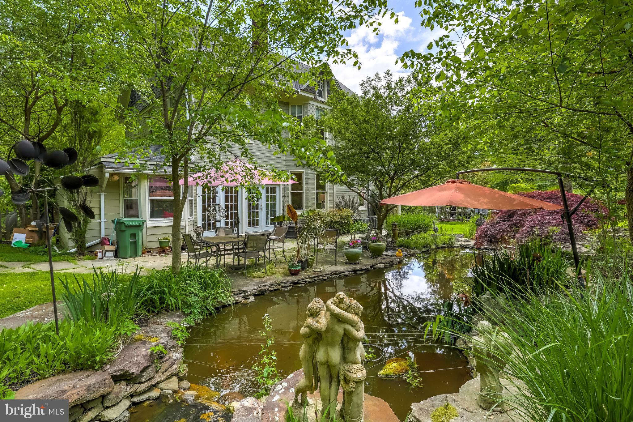 1802 Dixon Road Baltimore, MD 21209 - Photo 60 of 61 Koi pond w/ cascading waterfall