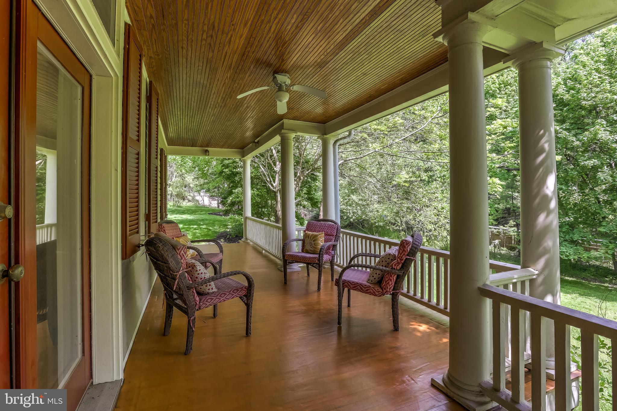 1802 Dixon Road Baltimore, MD 21209 - Photo 8 of 61 Porch with ceiling fan for added comfort