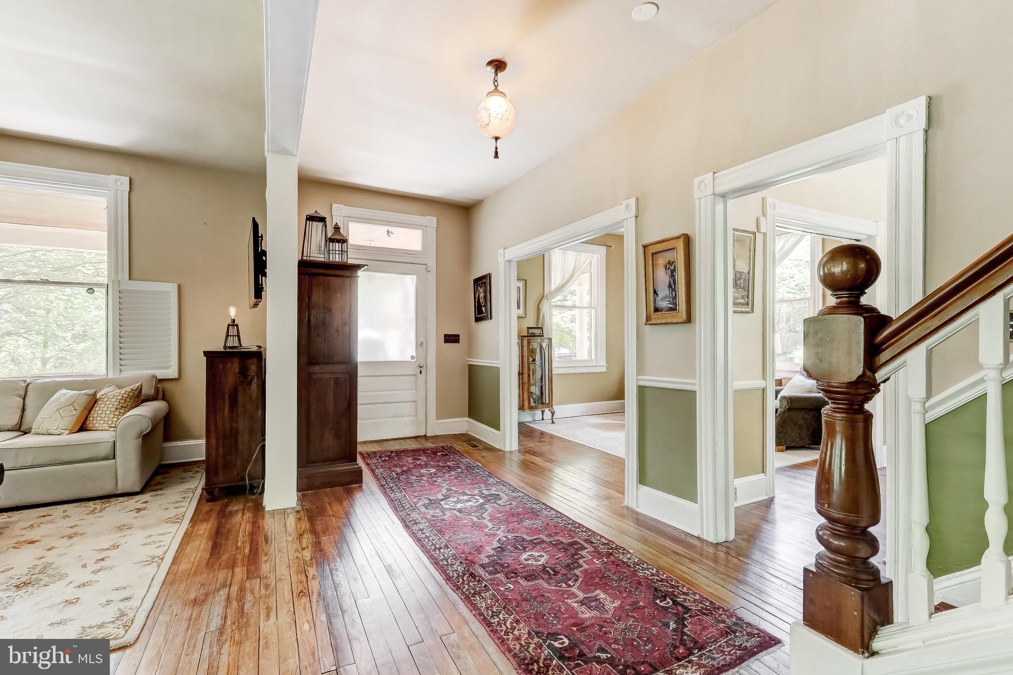 1802 Dixon Road Baltimore, MD 21209 - Photo 10 of 61 Beautiful living room w/hardwood flooring