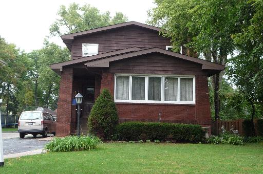 238 Herrick Road Riverside, IL 60546 - Photo 1 of 1 a front view of a house with a yard