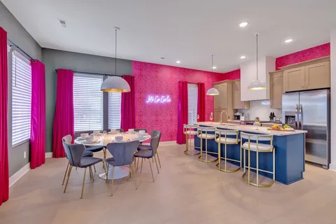 a bedroom with furniture and a fireplace