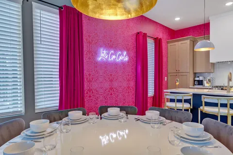 a kitchen with a stove a sink and a refrigerator