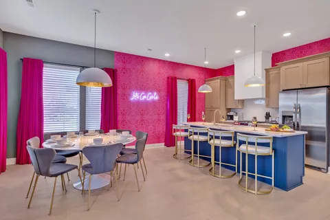 a view of a dining room with furniture