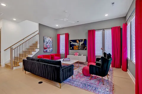 a living room with furniture and rug
