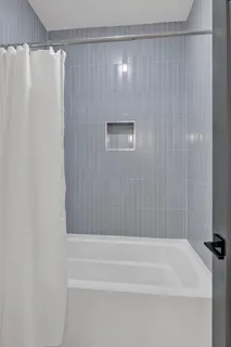 a outdoor living space with furniture and a potted plant