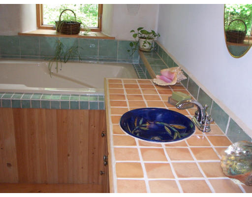 92 Dudleyville Road Leverett, MA 01054 - Photo 17 of 29 a bathroom with a sink and a mirror