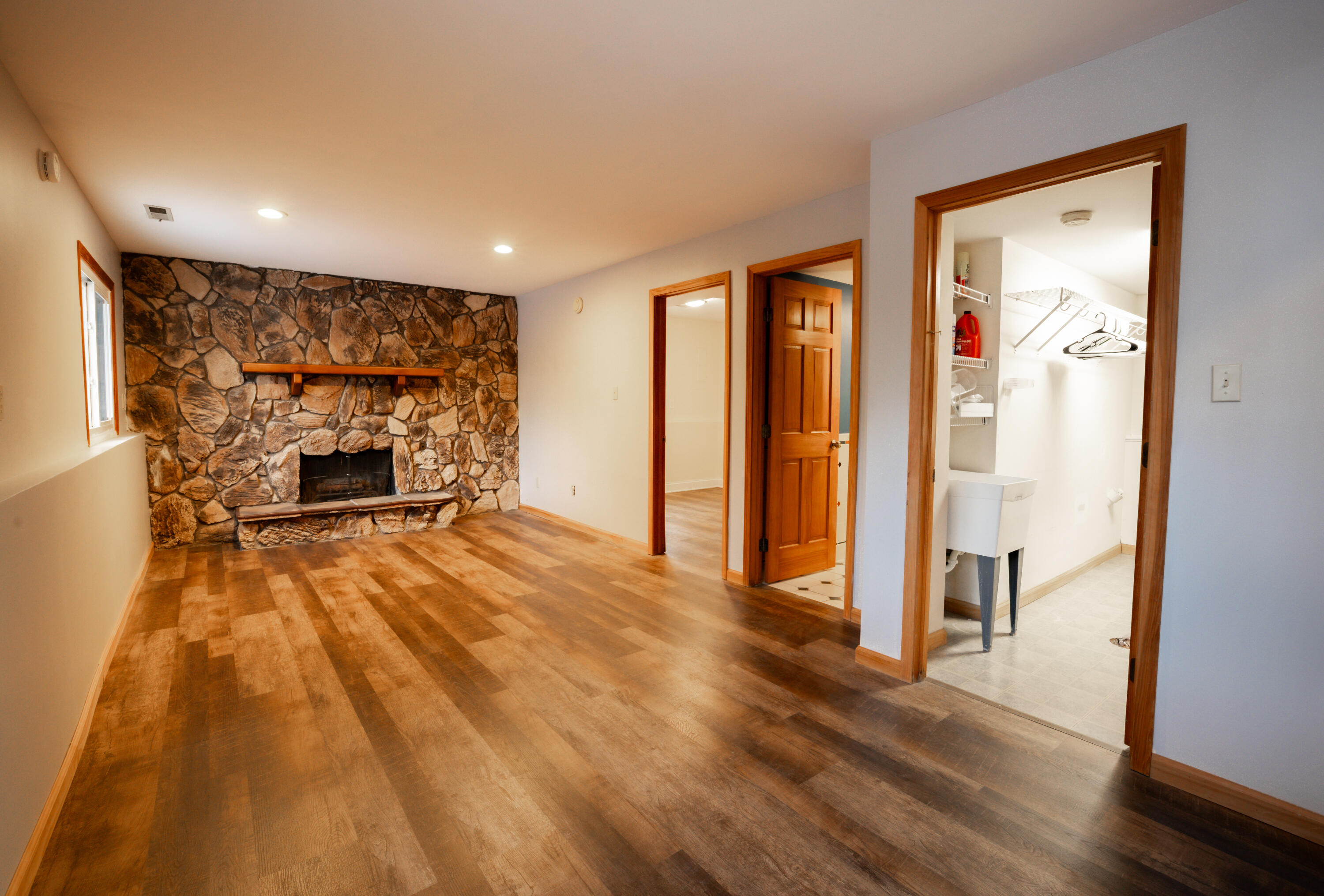 3229 Rustic Lane Crown Point, IN 46307 - Photo 11 of 18 a furnished livingroom with a fireplace and wooden floor