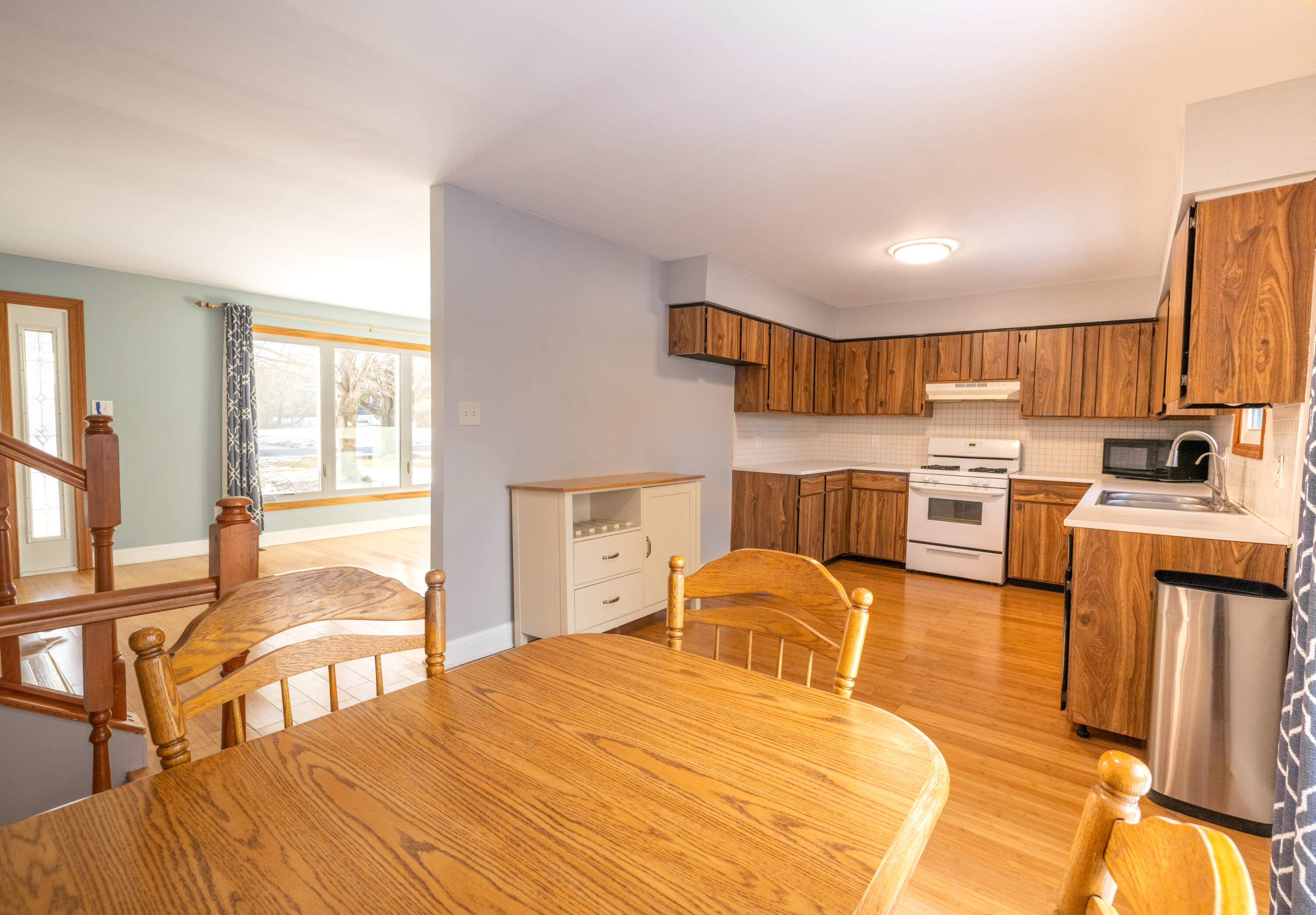 3229 Rustic Lane Crown Point, IN 46307 - Photo 8 of 18 a bedroom with a bed and wooden cabinets