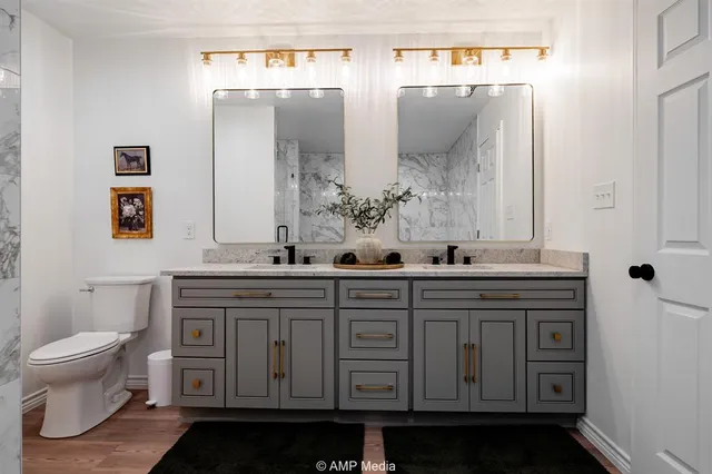 a bathroom with a bathtub and shower