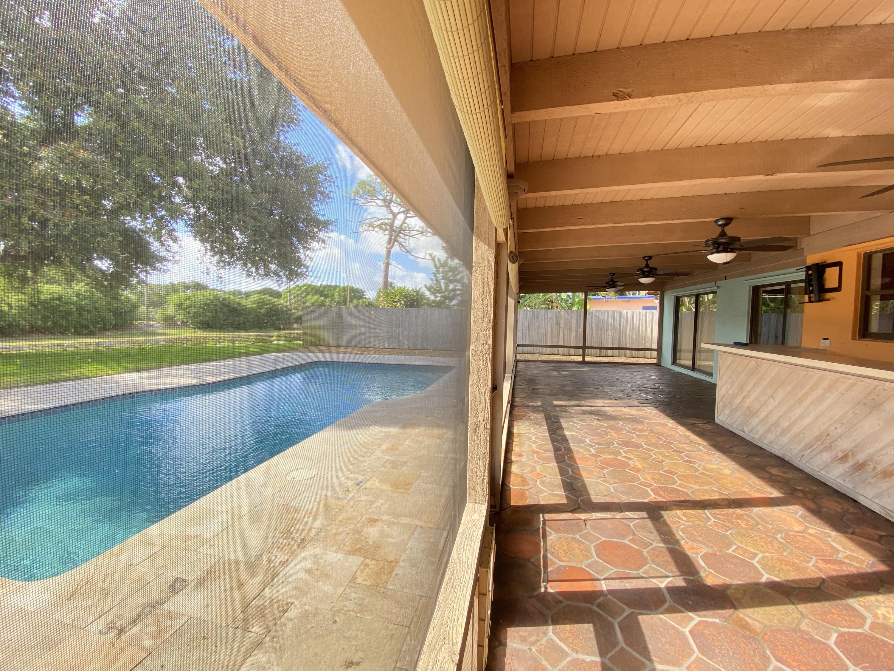7146 Thompson Road Boynton Beach, FL 33426 - Photo 3 of 23 Covered porch