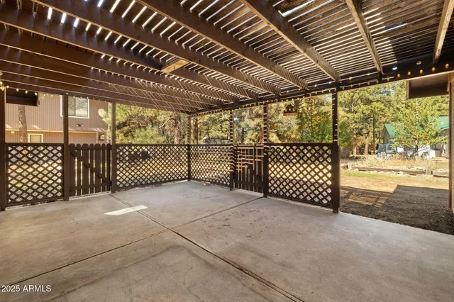 a view of a yard covered with snow