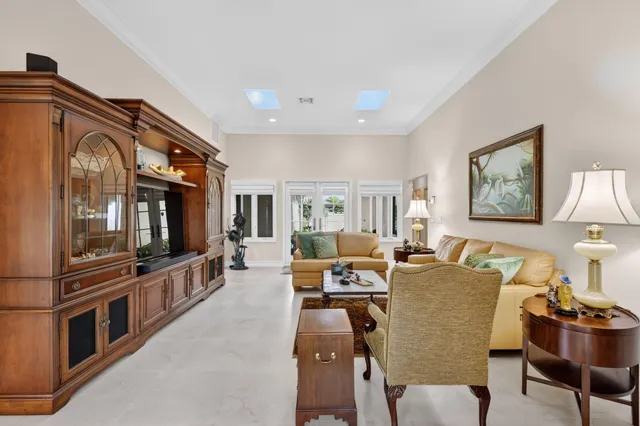 a bedroom with a bed and cabinets