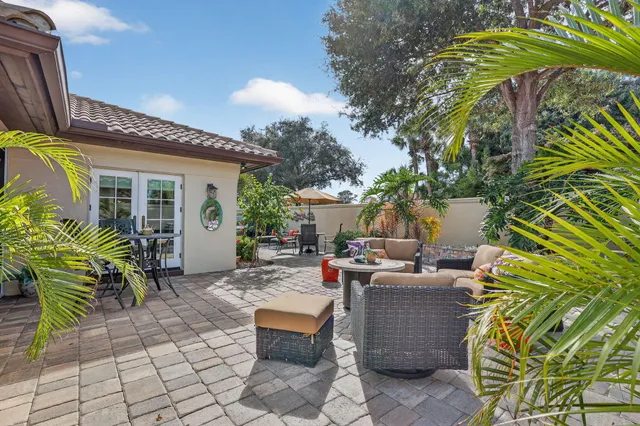 an aerial view of residential houses with outdoor space and street view