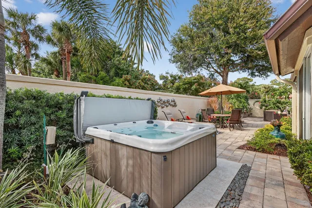 a view of swimming pool is middle in the garden