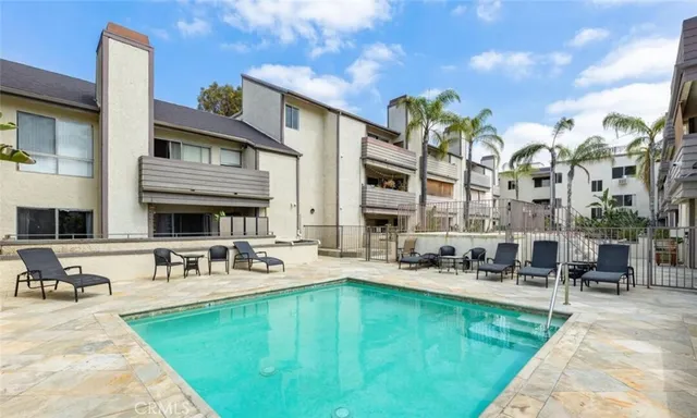 a front view of building with outdoor seating