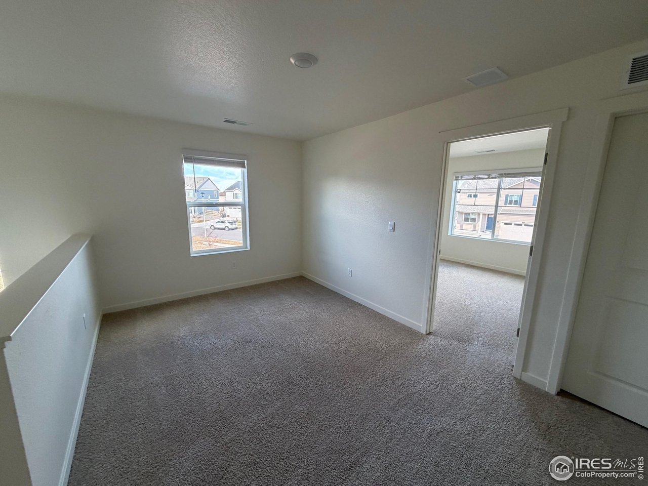 107 65th Avenue Greeley, CO 80634 - Photo 22 of 38 Patio room on upper level