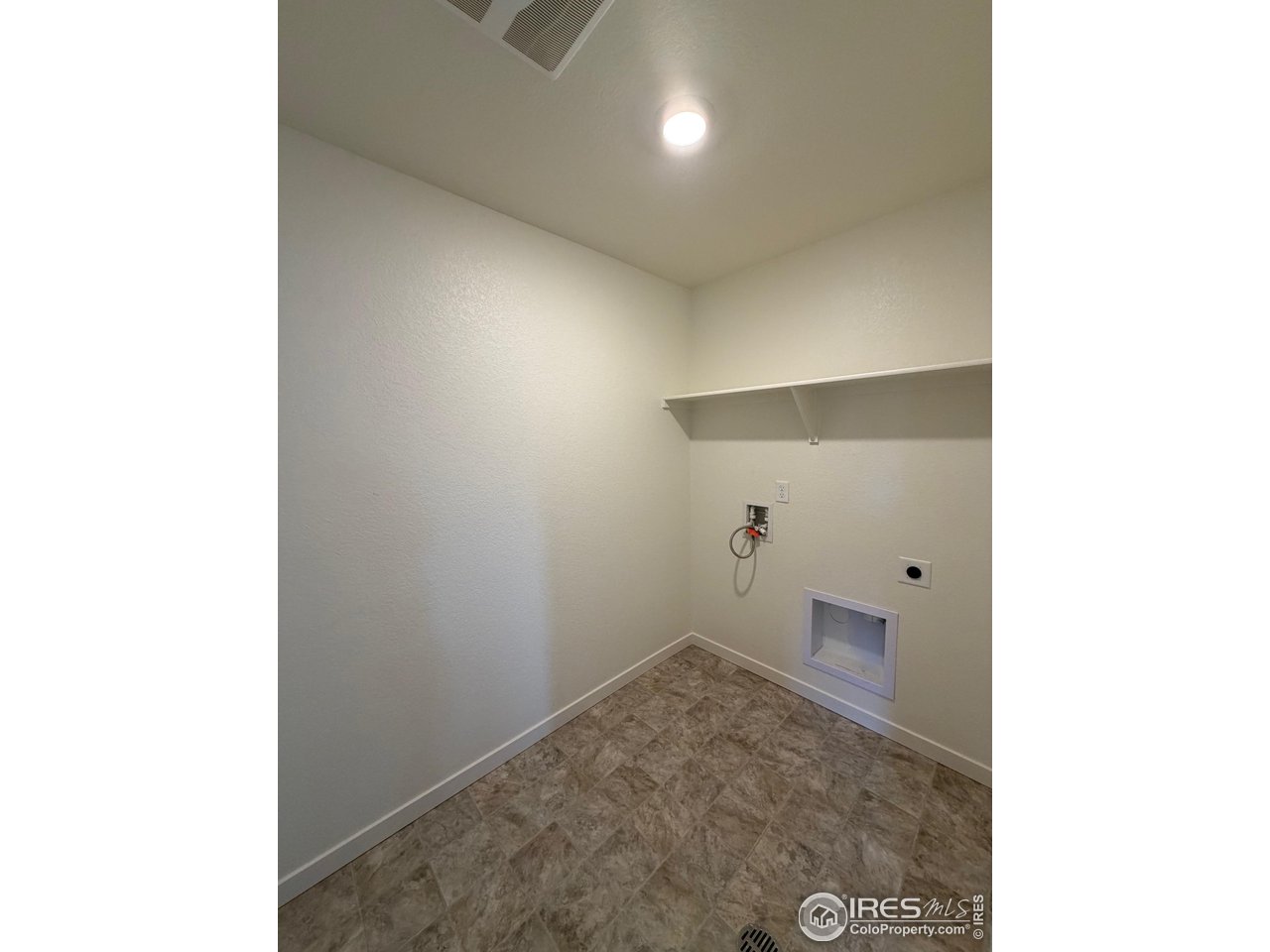 107 65th Avenue Greeley, CO 80634 - Photo 29 of 38 Laundry room on upper level
