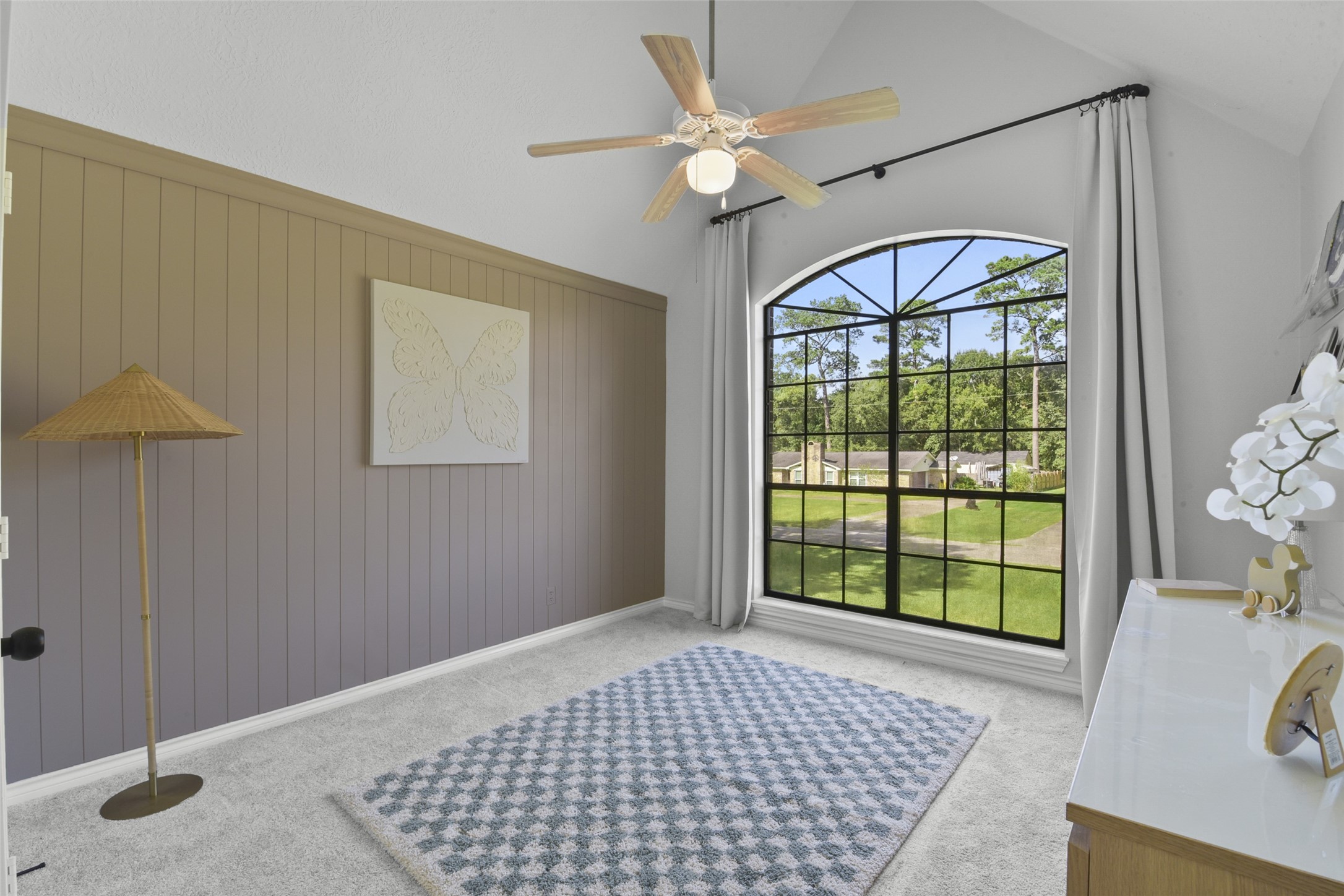 223 Oetken West Road Anahuac, TX 77514 - Photo 32 of 50 a bedroom with a bed and a window