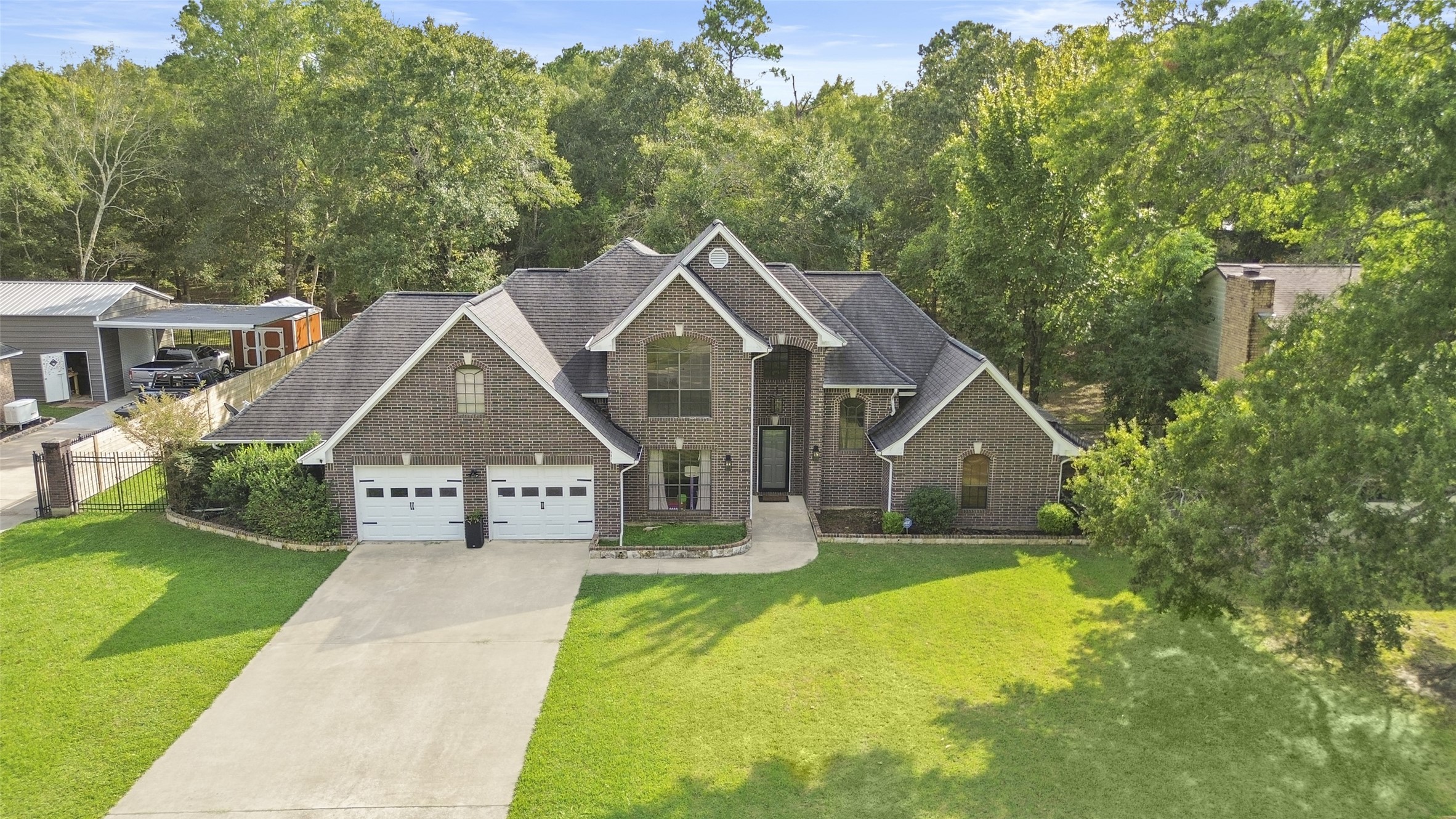 223 Oetken West Road Anahuac, TX 77514 - Photo 44 of 50 a front view of a house with yard and green space