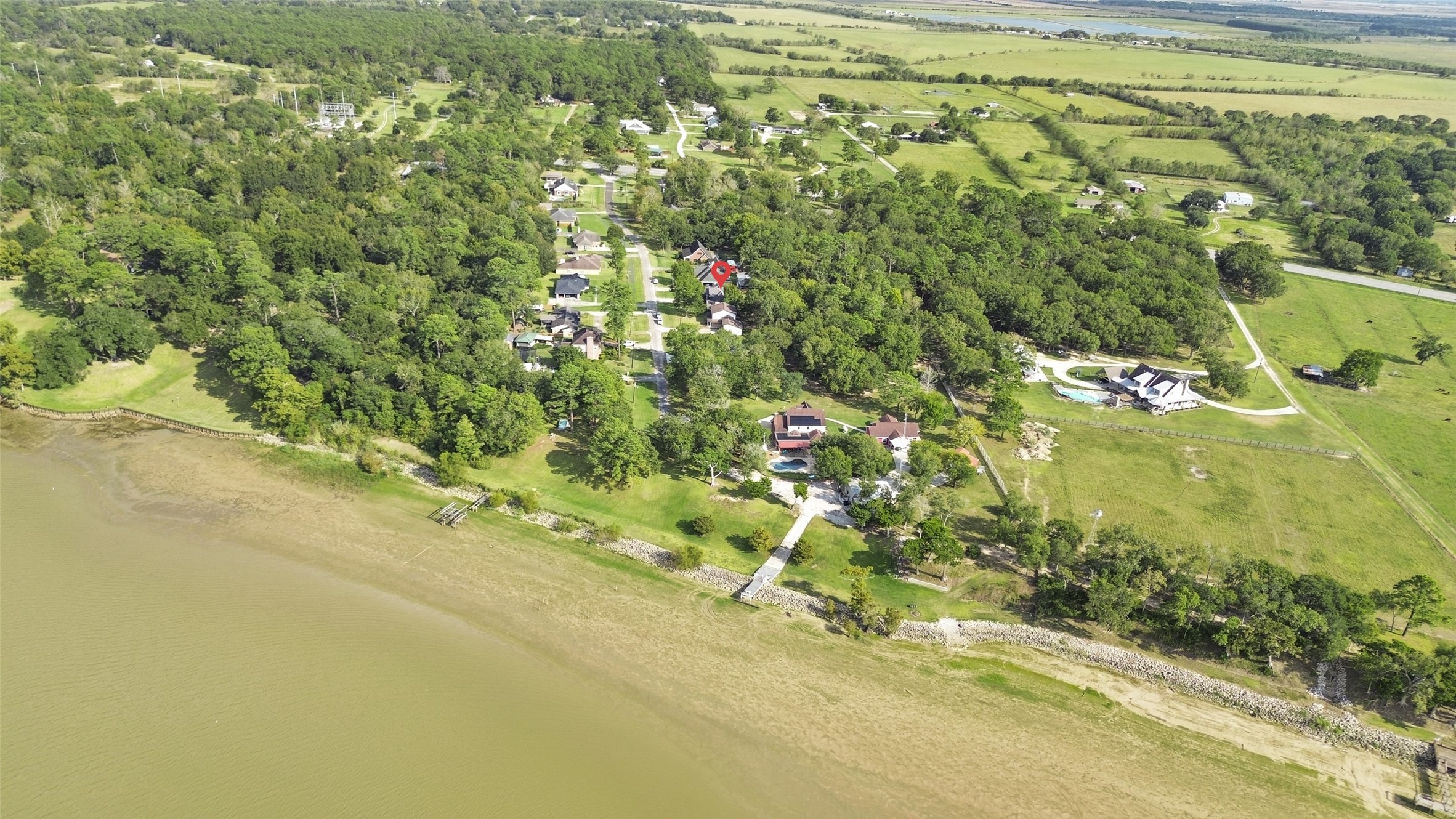 223 Oetken West Road Anahuac, TX 77514 - Photo 50 of 50 a view of a yard with an outdoor space