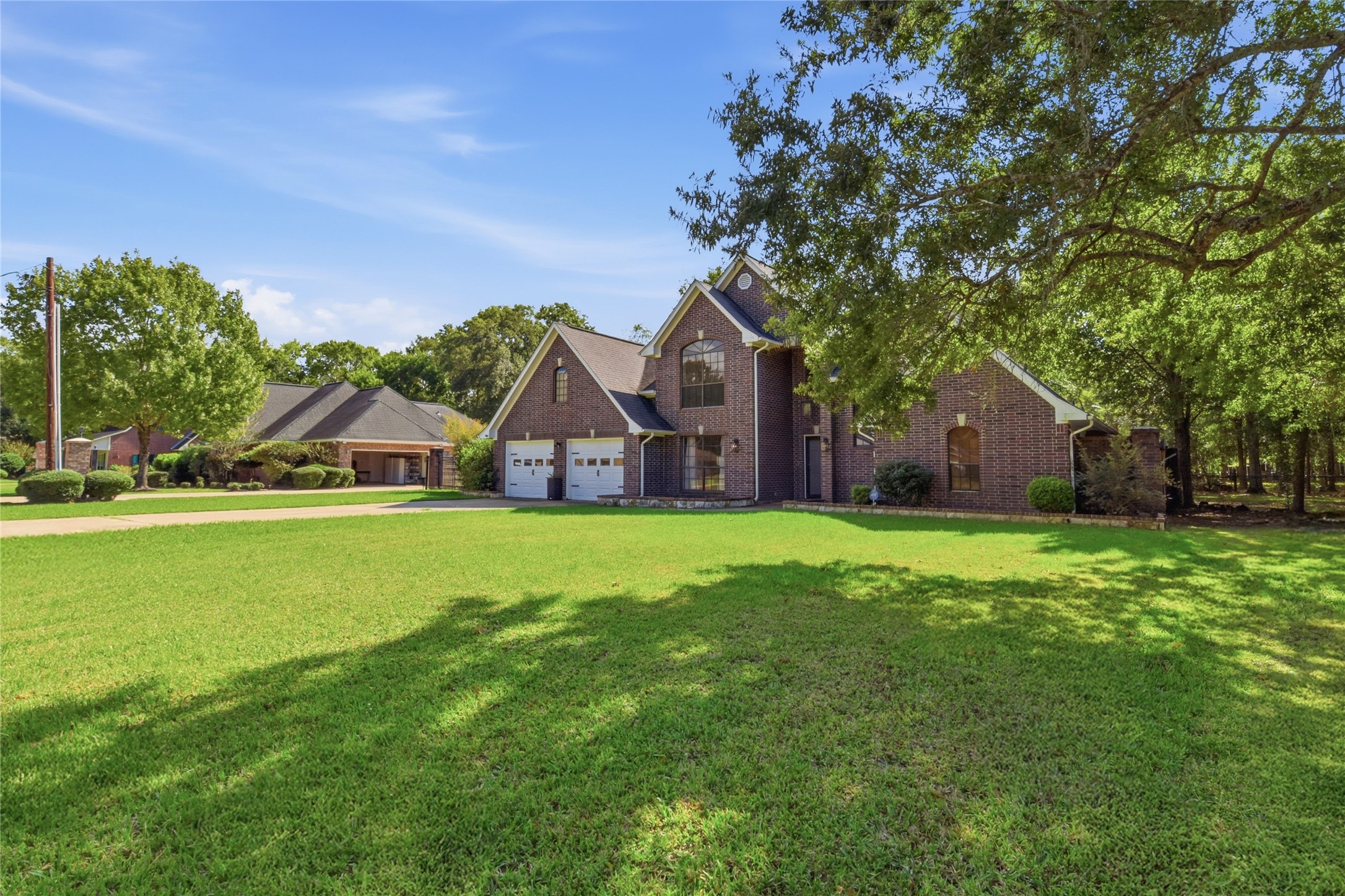 223 Oetken West Road Anahuac, TX 77514 - Photo 6 of 50 a front view of house with yard and green space
