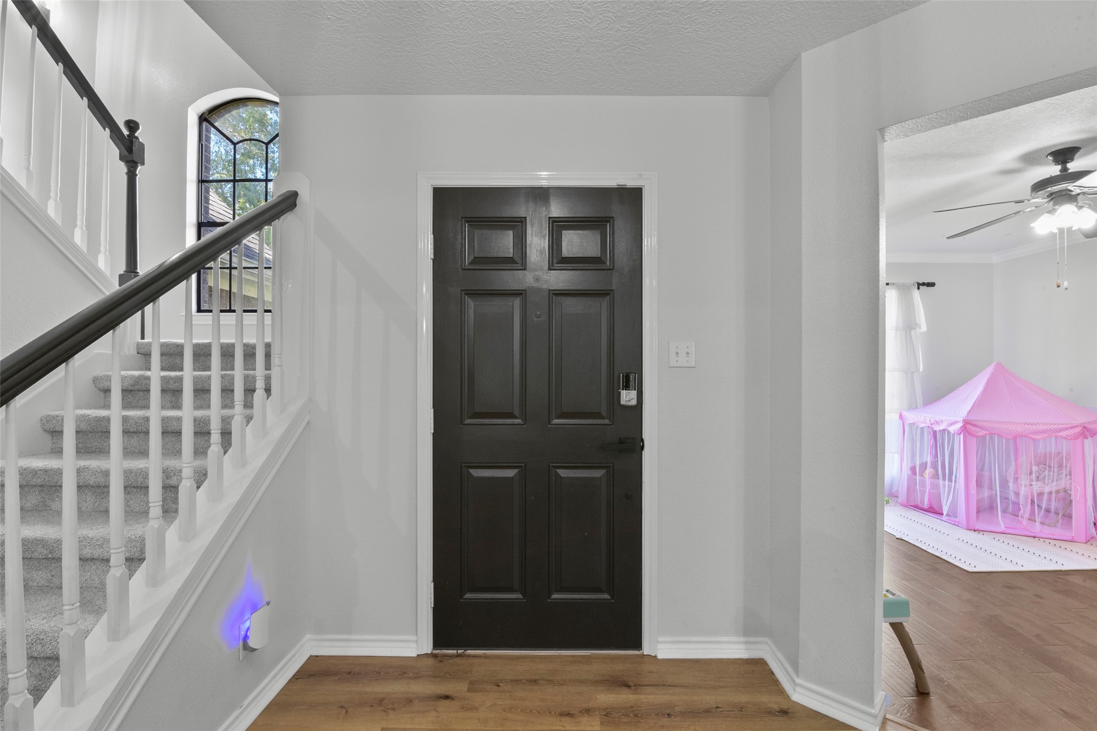 223 Oetken West Road Anahuac, TX 77514 - Photo 9 of 50 a view of an entryway with wooden floor