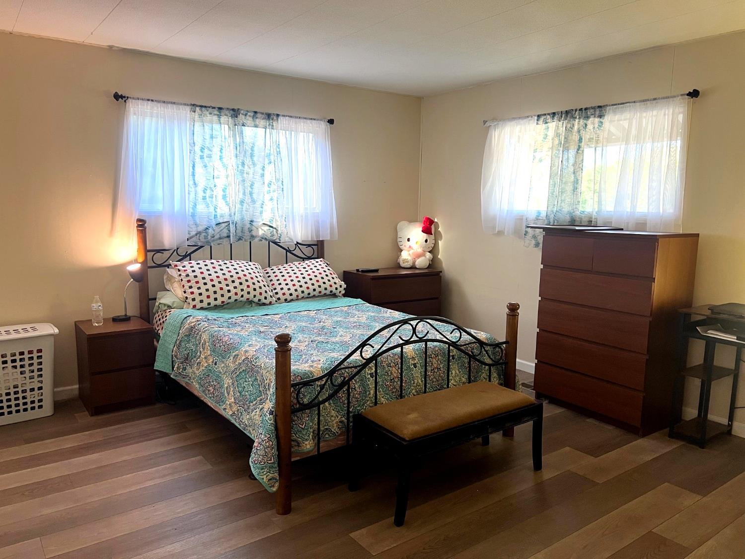 4350 Cherokee Road, Unit 46 Stockton, CA 95215 - Photo 10 of 20 a bedroom with a bed a dresser and window