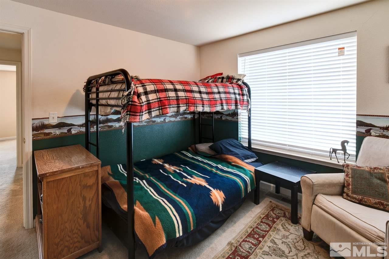 4363 Rancheria Road Fallon, NV 89406 - Photo 13 of 21 a bedroom with a bed and a window