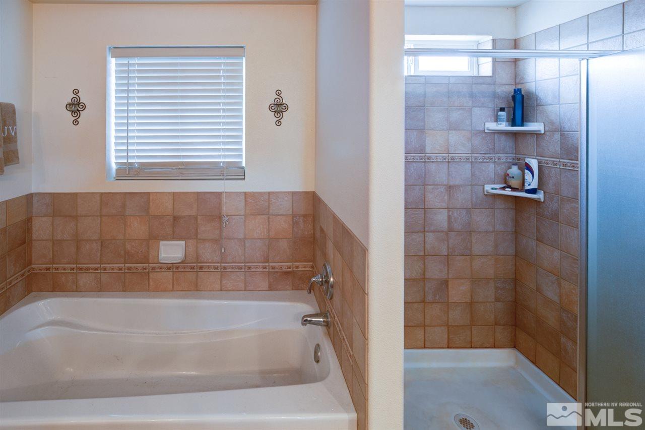 4363 Rancheria Road Fallon, NV 89406 - Photo 18 of 21 a bathroom with a bathtub