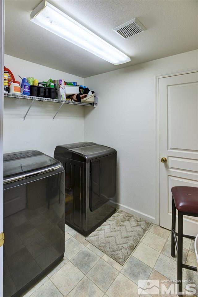 4363 Rancheria Road Fallon, NV 89406 - Photo 19 of 21 a kitchen with a sink and cabinets