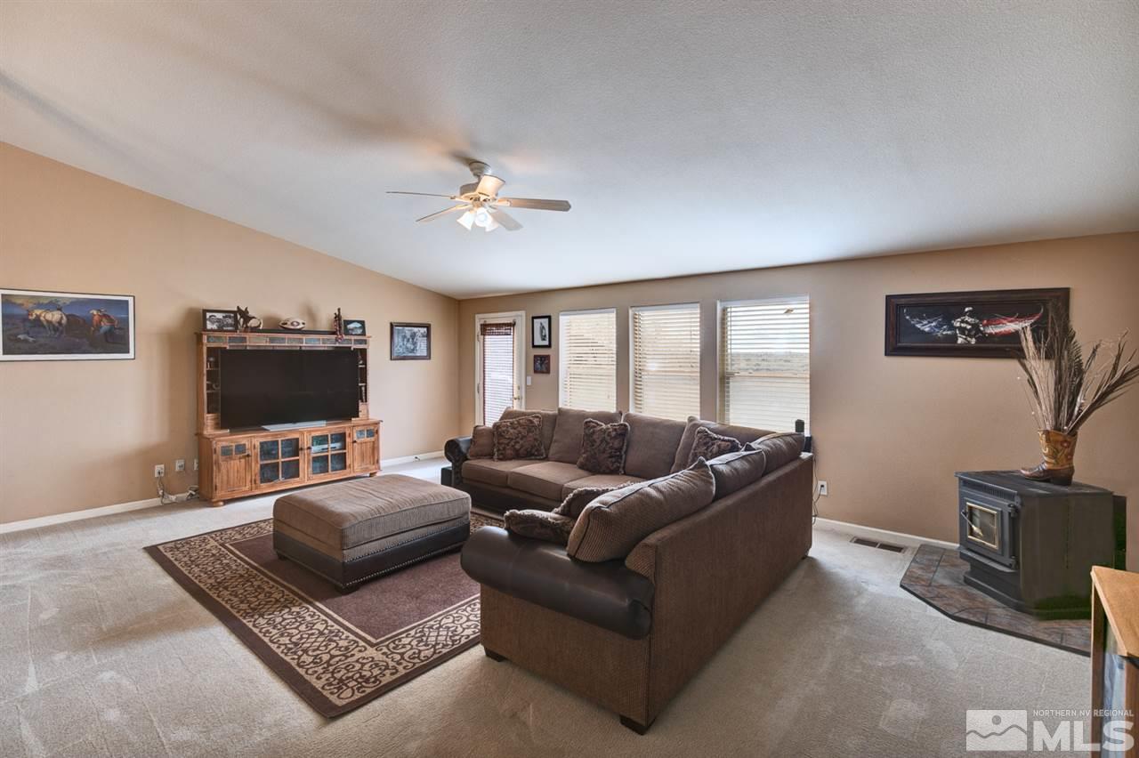 4363 Rancheria Road Fallon, NV 89406 - Photo 6 of 21 a living room with furniture and a flat screen tv