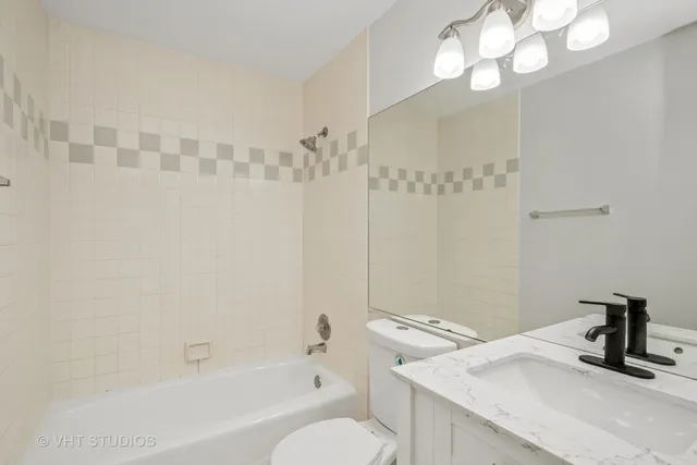 $560,000 | 4721 South Woodlawn Avenue, Unit E, Chicago, IL 60615