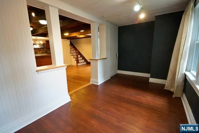 a view of an empty room and window