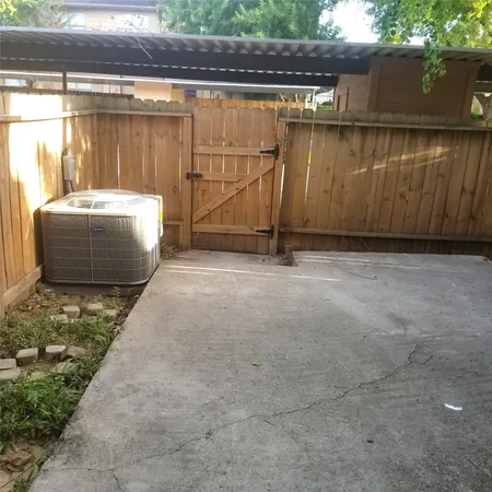 a view of backyard with green space